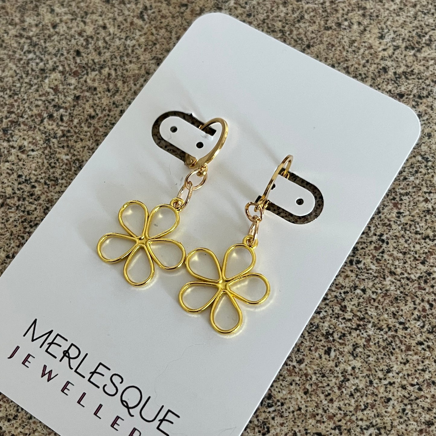 Gold daisy earrings 