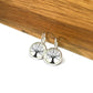 Tree of life on a pearl background glass dome  earrings