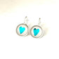 Beauitful Aqua blue heart glass dome earrings in a silver setting