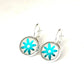 Metallic Aqua blue daisy glass dome earrings in a silver setting