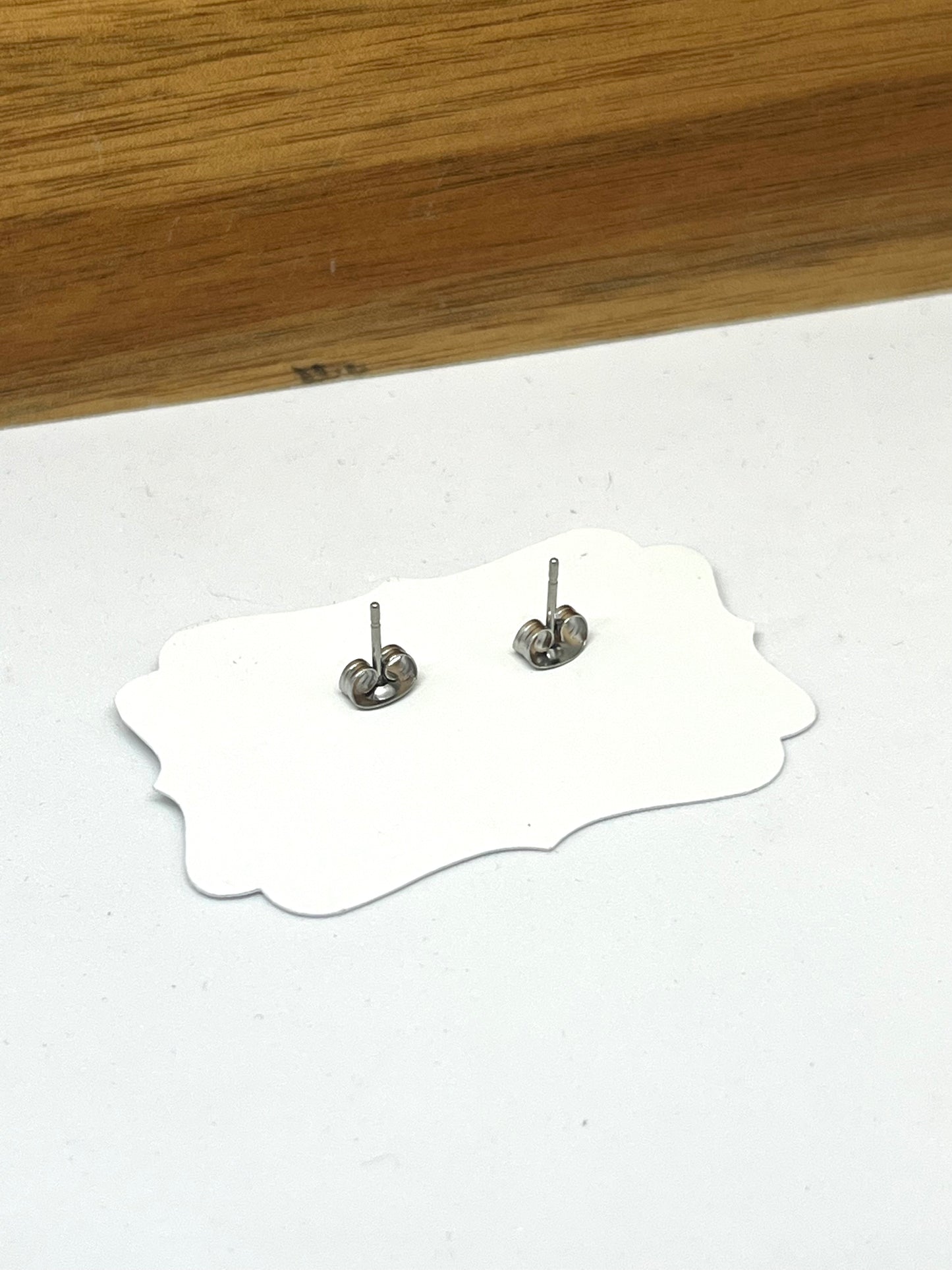 TINY SILVER HEARTS STUDS